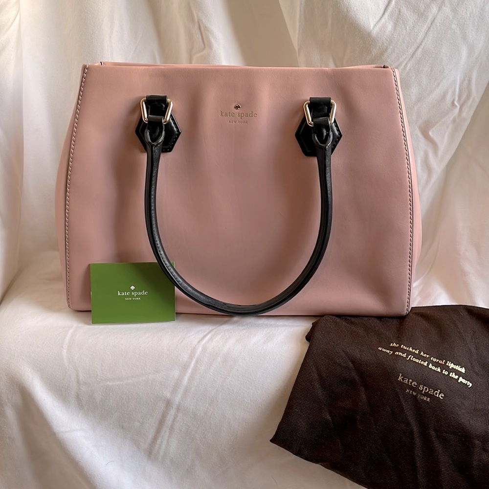 Pink kate spade leather tote with black handles